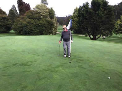 Mike's tee shot on the par 3 5th hole lands within 2 feet and he sinks the
birdie putt.